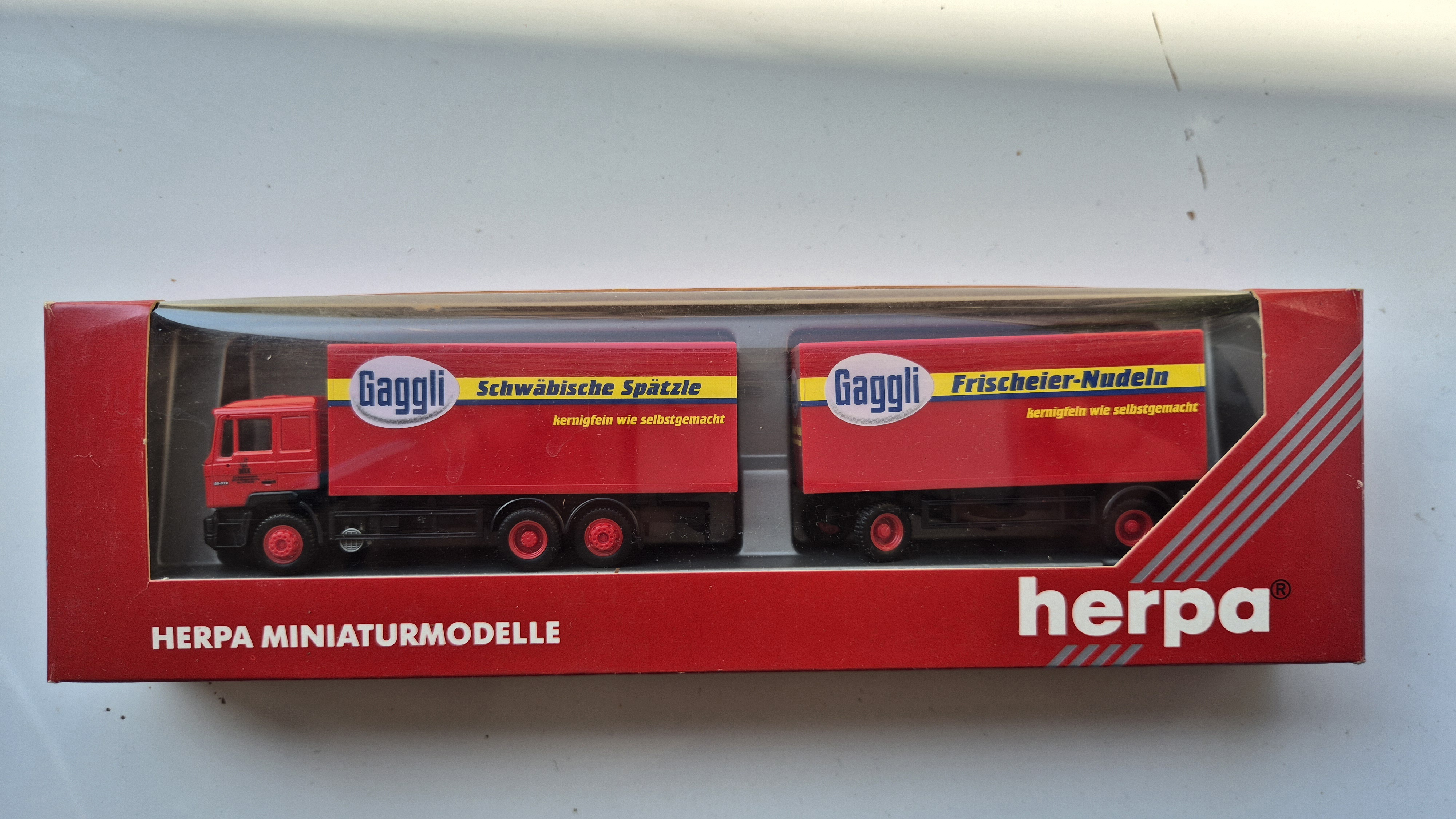 MAN F90 Gaggli Spätzle  1:87 Herpa 142472