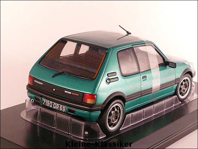 Peugeot 205 Griffe grün 1:18 Norev